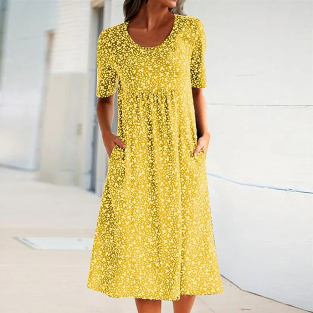 Deslumbra | Elegante vestido midi de manga corta con cuello redondo y bolsillos