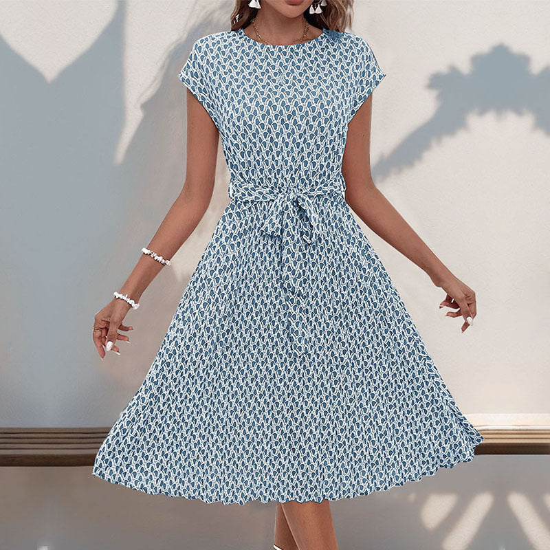 Deslumbra | Vestido plisado con estampado geométrico