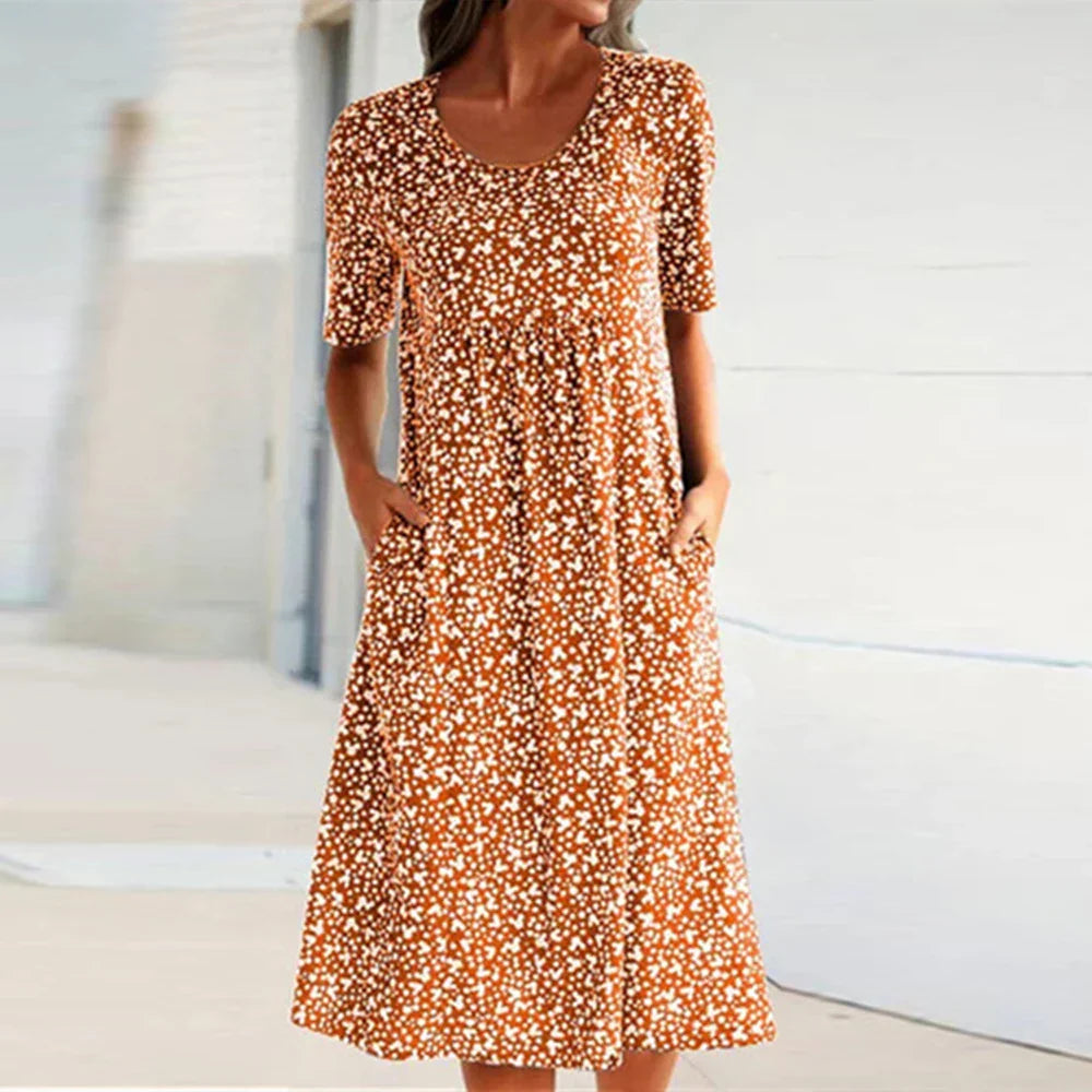 Deslumbra | Elegante vestido midi de manga corta con cuello redondo y bolsillos